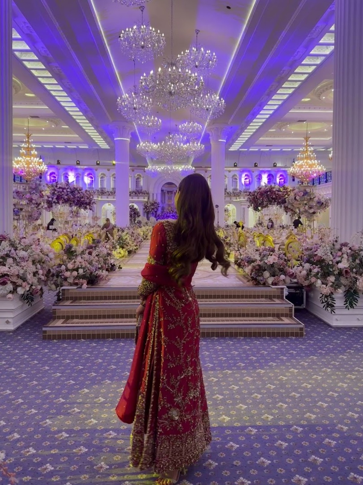 Red bridal outfit with gold embroidery