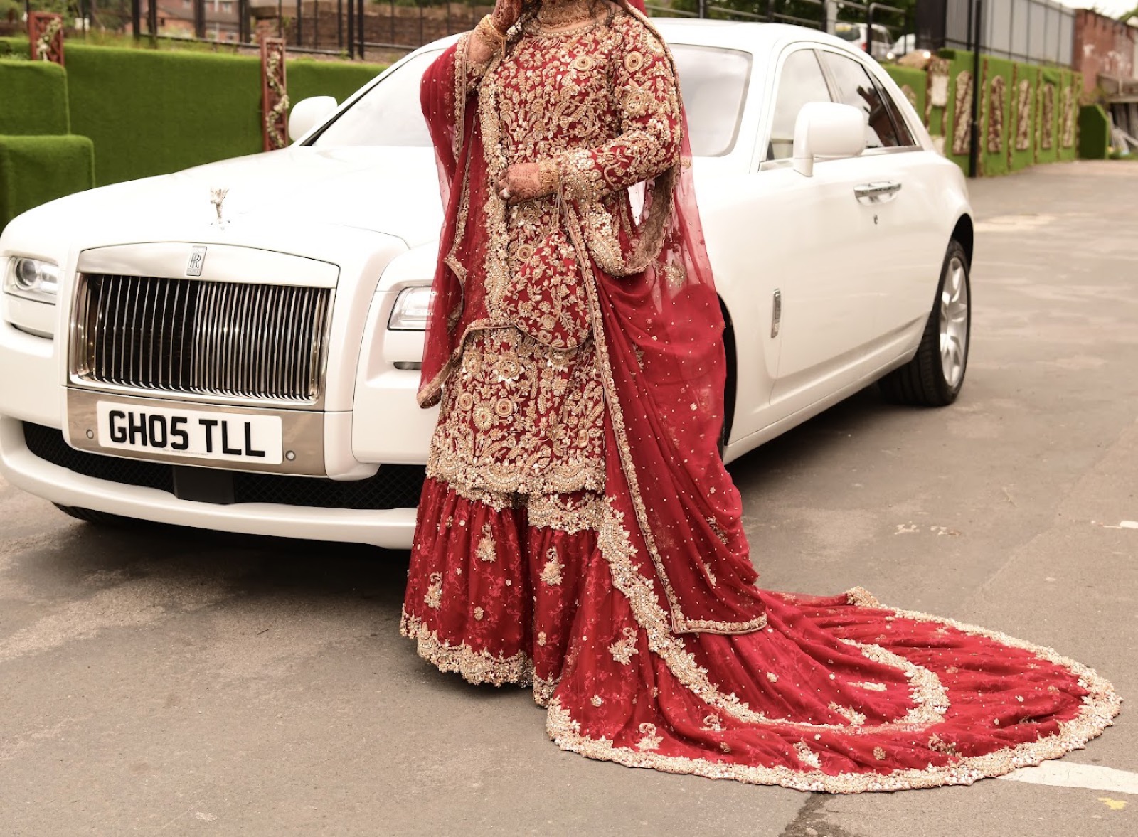 Traditional bridal lengha with long embroidered train