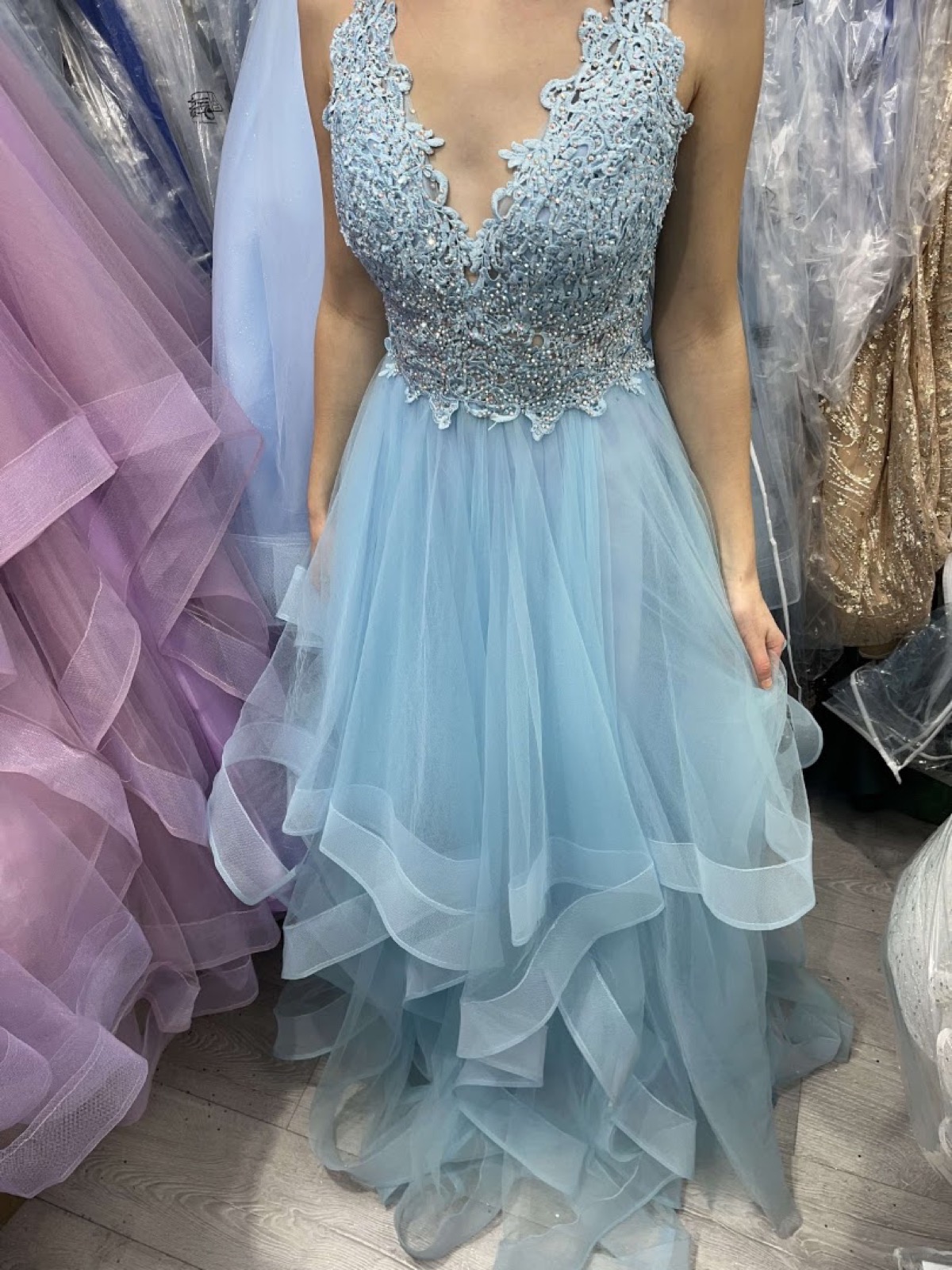 Pastel occasion dresses in the boutique